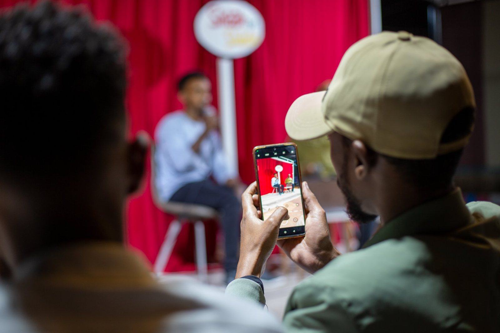 Recording Shaah iyo Shaxan in front of the red curtain